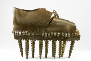 Apparently a shoe from France meant for crushing chestnuts. Image via batashoemuseum.ca